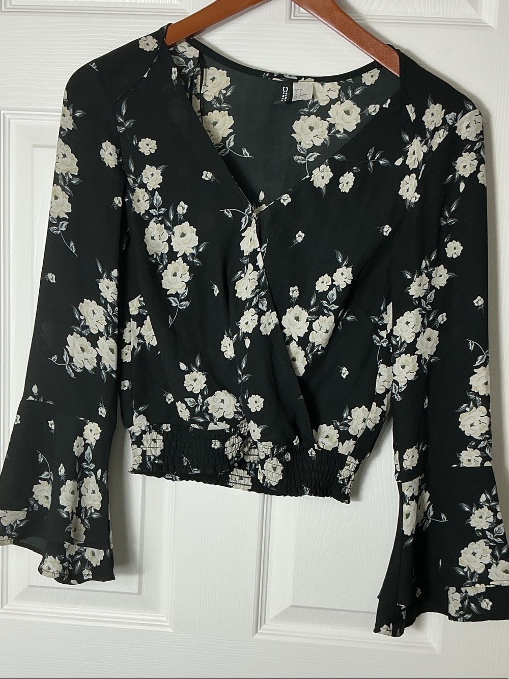 4 for $20
Divided Black Floral Wrap Blouse